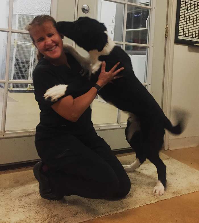 Dr. Cindi Delany with a dog