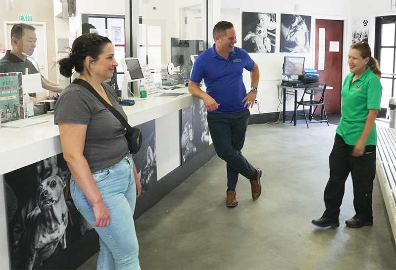 Shelter Learniverse team members chat with staff at Front Street Shelter